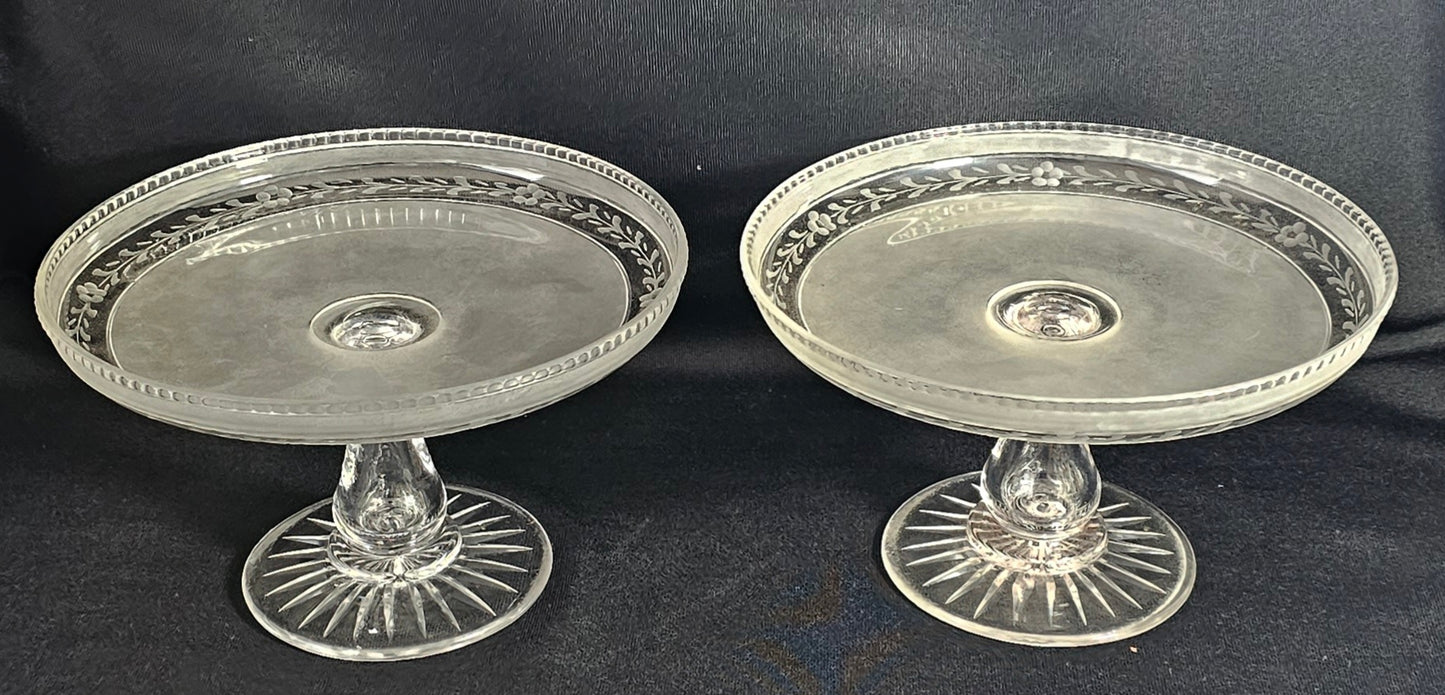 A Pair of Victorian Semi Frosted and Wheel Engraved Glass Tazze on star cut foot.