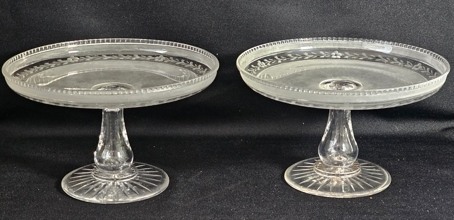 A Pair of Victorian Semi Frosted and Wheel Engraved Glass Tazze on star cut foot.
