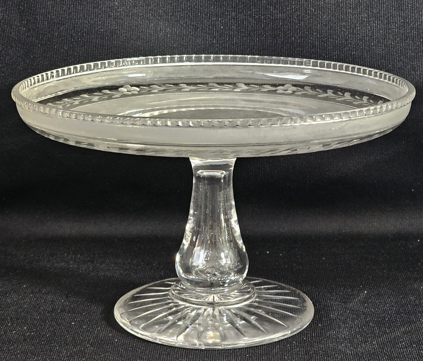 A Pair of Victorian Semi Frosted and Wheel Engraved Glass Tazze on star cut foot.