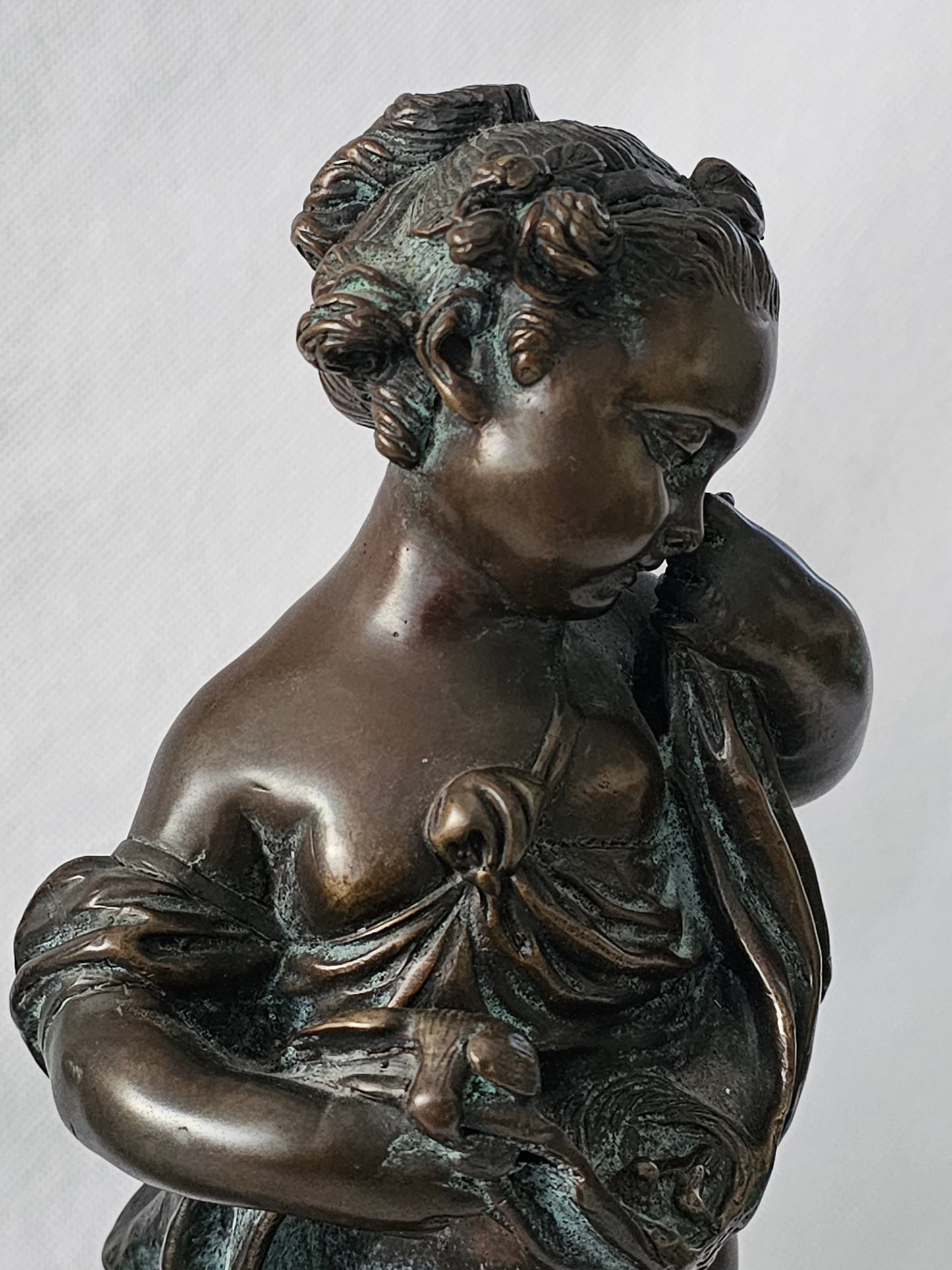 An Antique Pair of Bronze Patinaed Putti Cherubs on Marble Plinths,