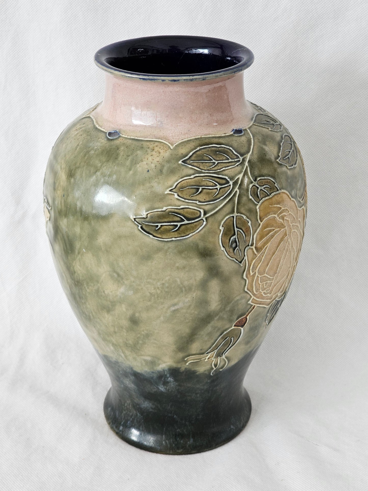 A Royal Doulton stoneware vase, Decorated with Roses, Signed by Bessie Newbery