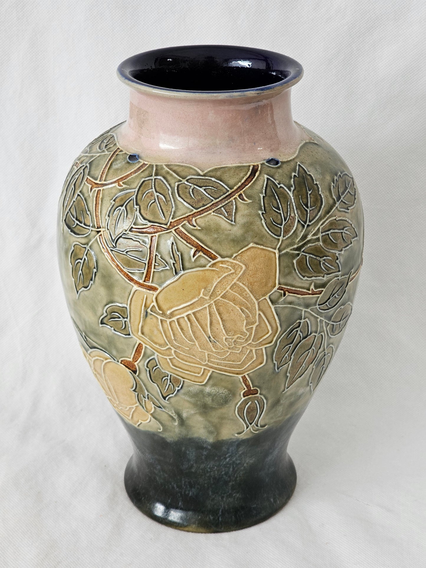A Royal Doulton stoneware vase, Decorated with Roses, Signed by Bessie Newbery
