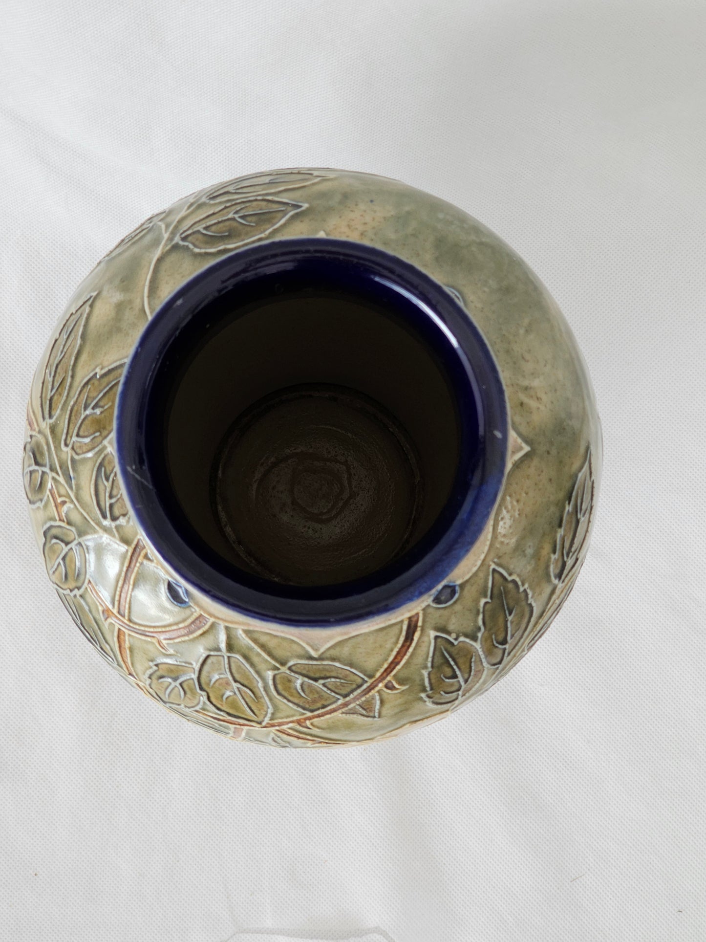 A Royal Doulton stoneware vase, Decorated with Roses, Signed by Bessie Newbery