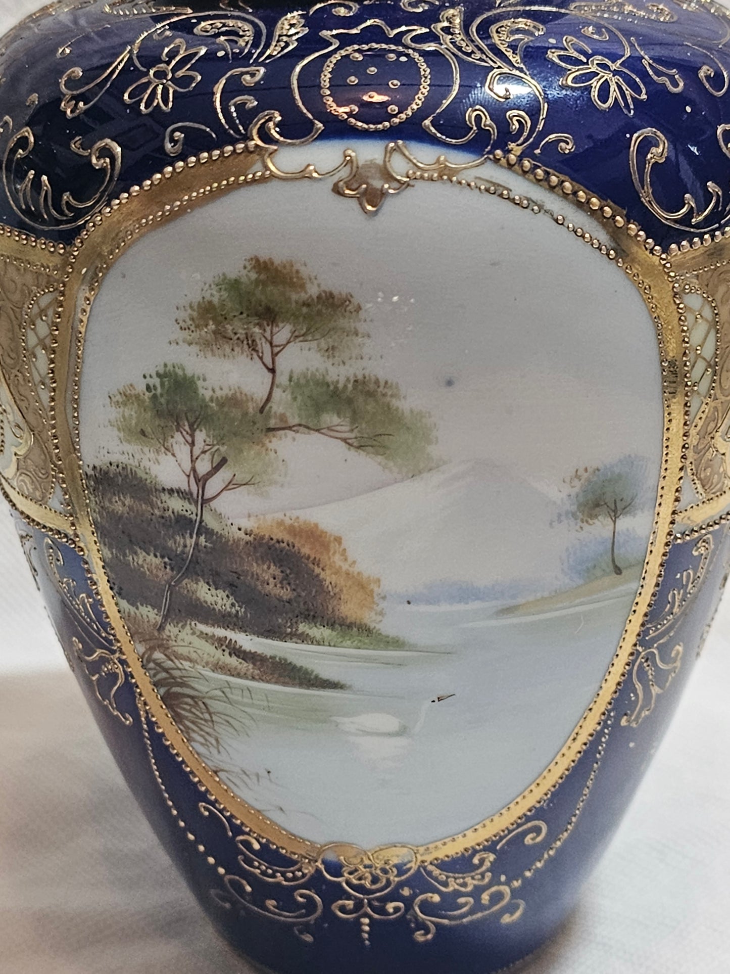 A Pair of Noritake Jars and Covers, C1930, Painted with Landscapes