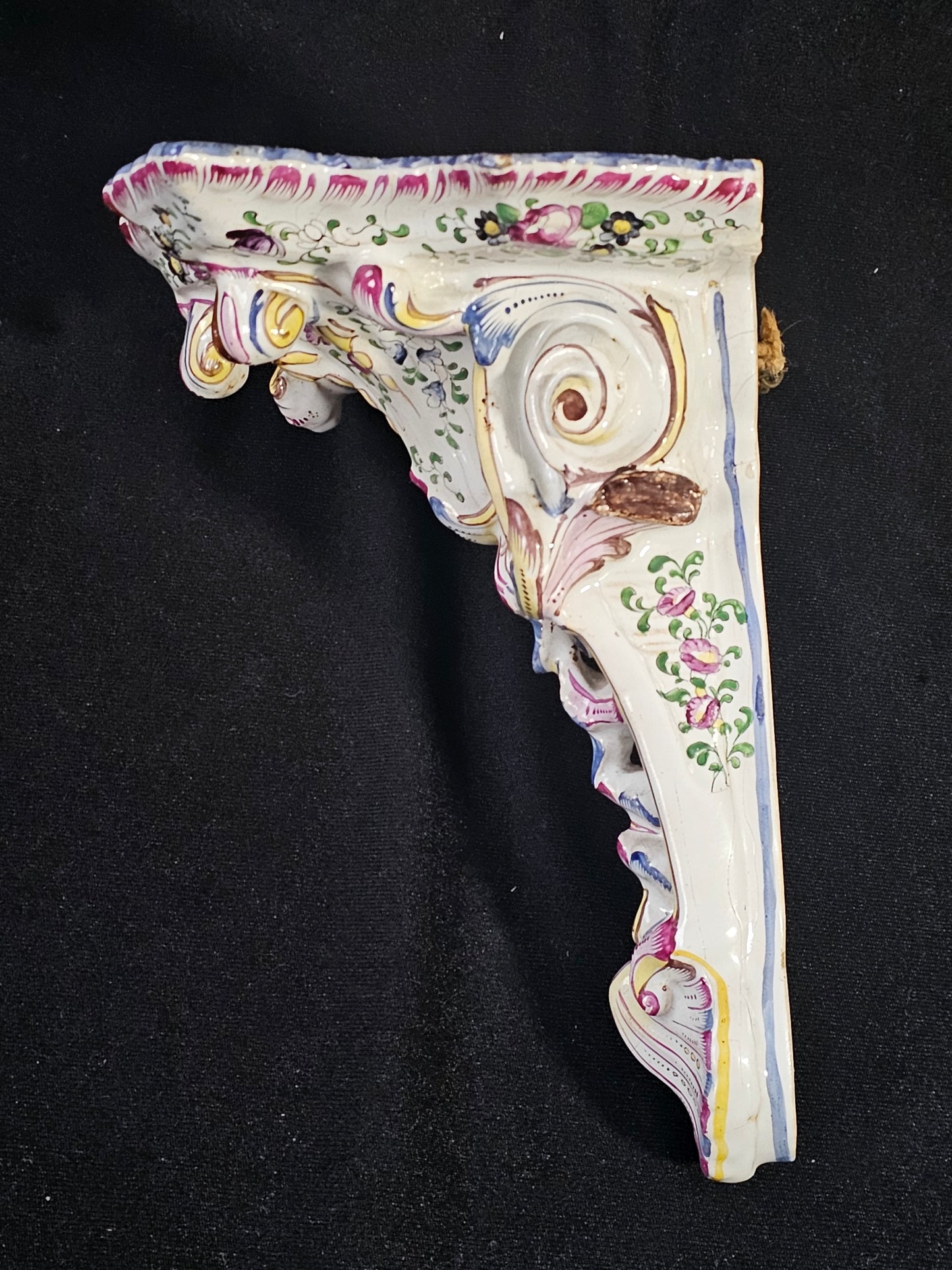 A 19thC French Faience Wall Shelf, of Scrolling Rococo Form