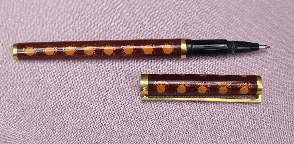 An S.T. Dupont Paris Laque de Chine Red & Gold Ballpoint Pen Gold Plated