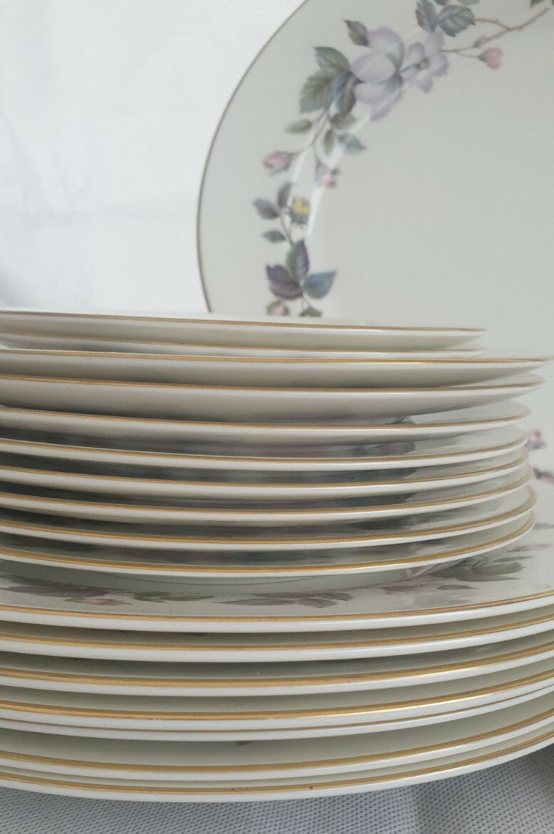 A Royal Worcester bone china June Garland pattern dinner service