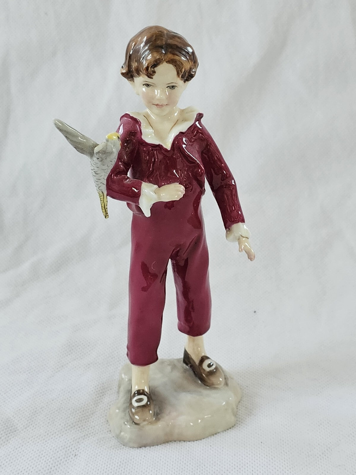 A Royal Worcester figure of the Parakeet, modelled by F G Doughty, no. 3087