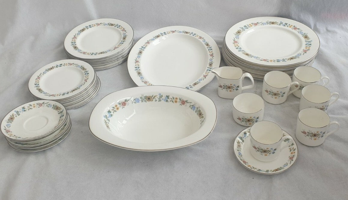 A ROYAL DOULTON BONE CHINA PASTORALE PATTERN DINNER SERVICE