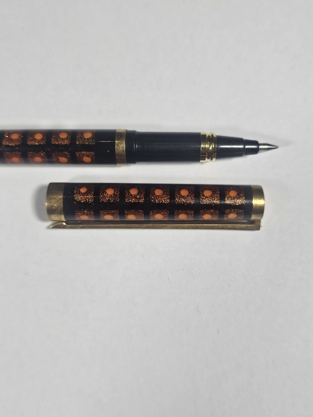 An S.T. Dupont Paris Laque de Chine Red & Gold Ballpoint Pen Gold Plated
