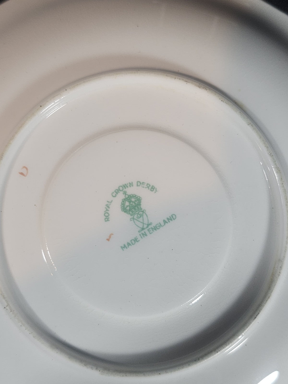 A Royal Crown Derby Rosemary Celadon A277 Pattern Saucer
