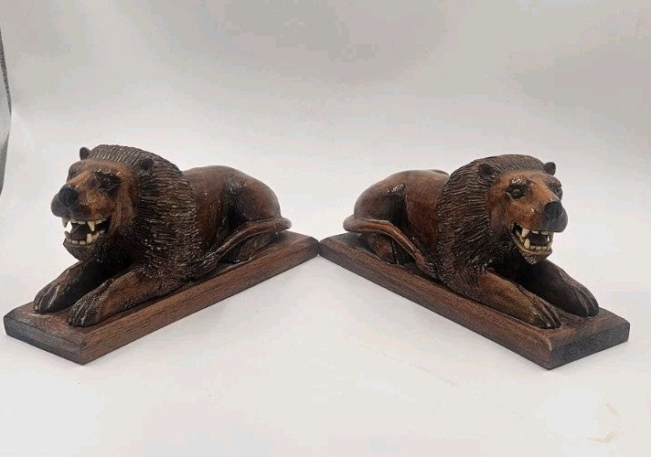An Antique Pair of Treen Recumbent Lions Hand Carved