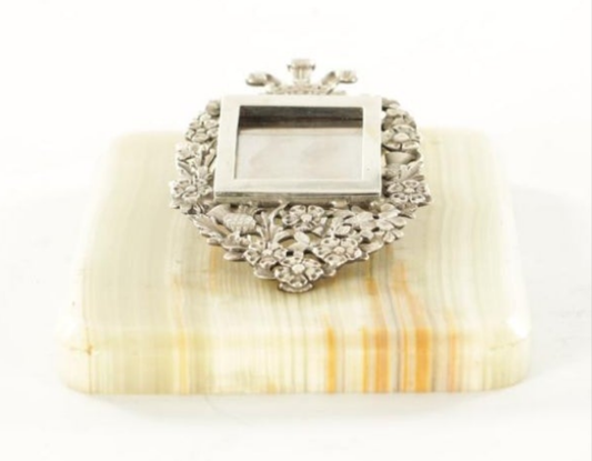 An Antique Horton & Allday Silver and Onyx Desk Clip and Photo Frame