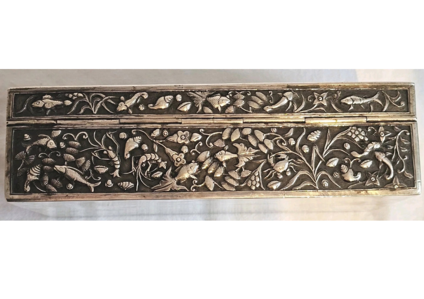 A 19thC Chinese Export Silver Cigarette Box Very Finely Repousse Decorated.