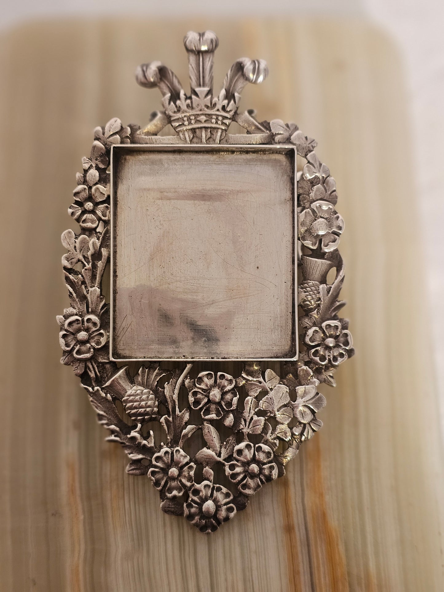 An Antique Horton & Allday Silver and Onyx Desk Clip and Photo Frame