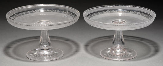 A Pair of Victorian Semi Frosted and Wheel Engraved Glass Tazze on star cut foot.