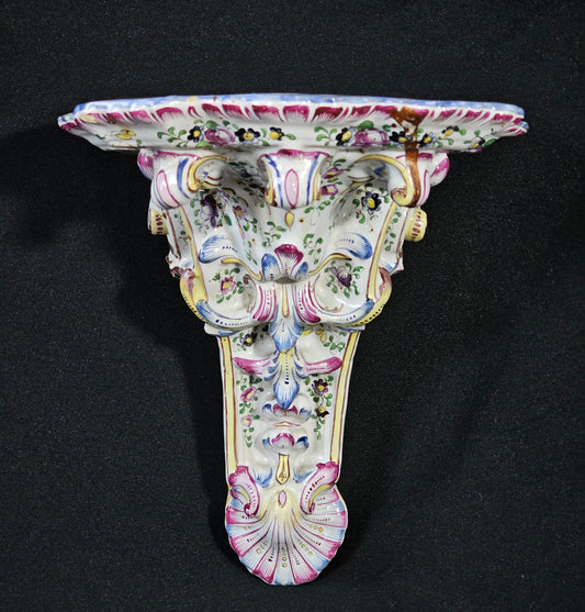 A 19thC French Faience Wall Shelf, of Scrolling Rococo Form