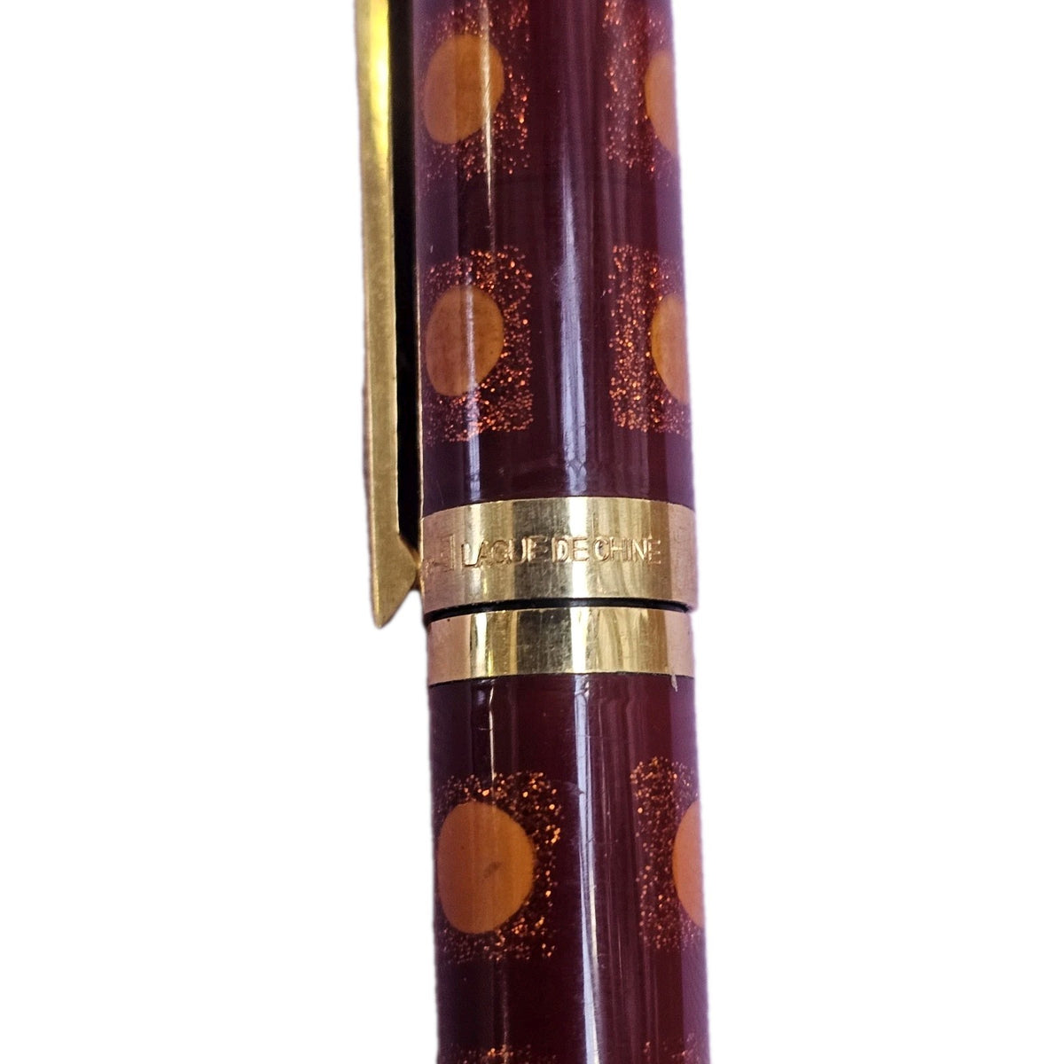 An S.T. Dupont Paris Laque de Chine Red & Gold Ballpoint Pen Gold Plated