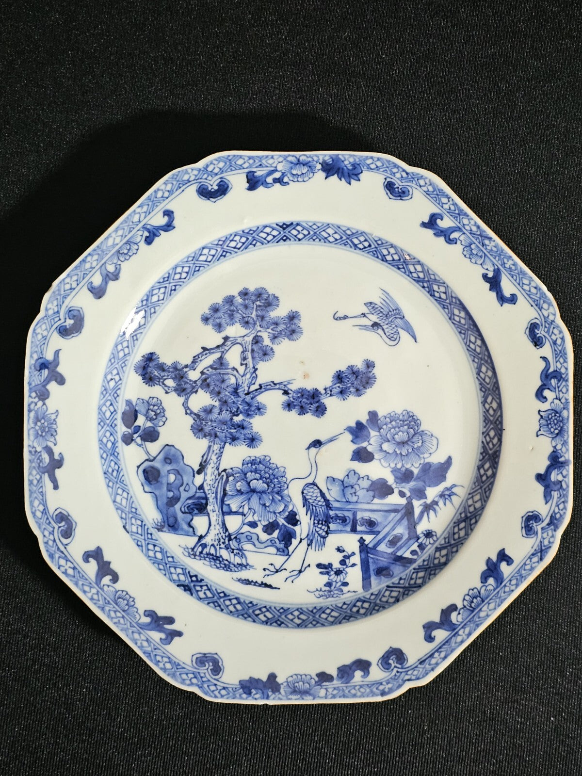 An 18thc Octagonal Shaped Chinese Export blue and White Plate, Hand Painted