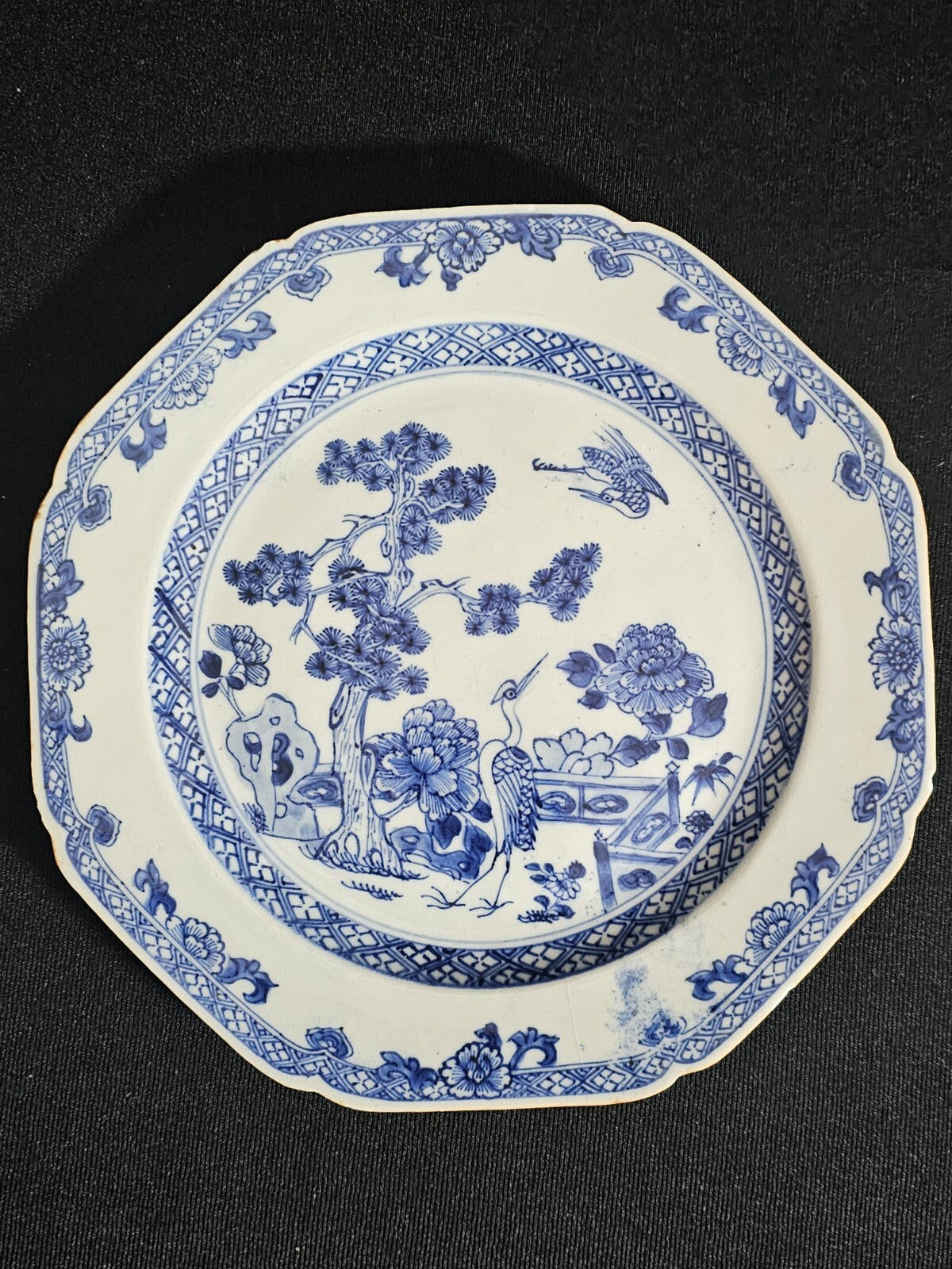 An 18thc Octagonal Shaped Chinese Export blue and White Plate, Hand Painted