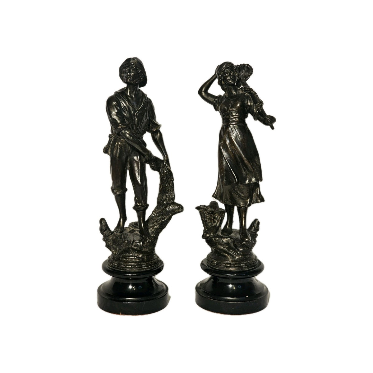 An Antique Pair of Bronzed Spelter Figures of a Fisherman and Woman,