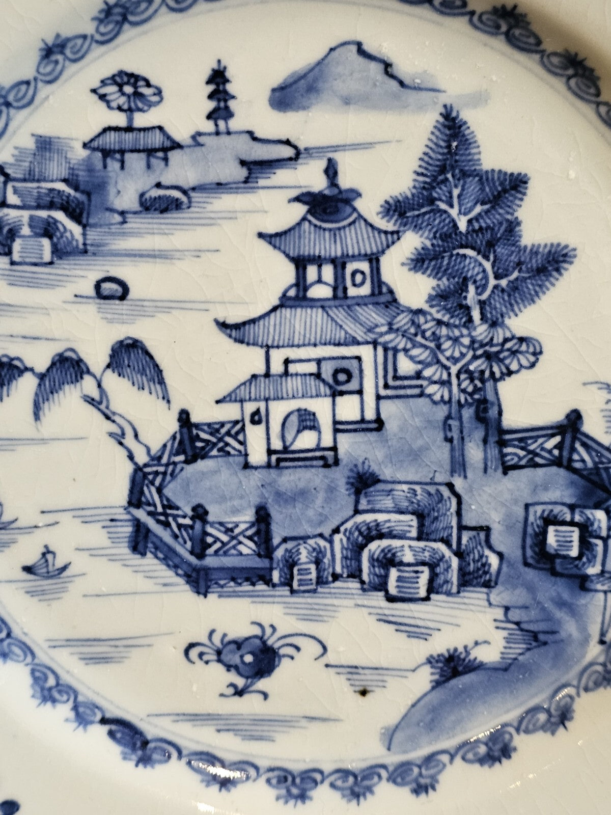 An 18thc Octagonal Shaped Chinese Export blue and White Plate, Hand Painted