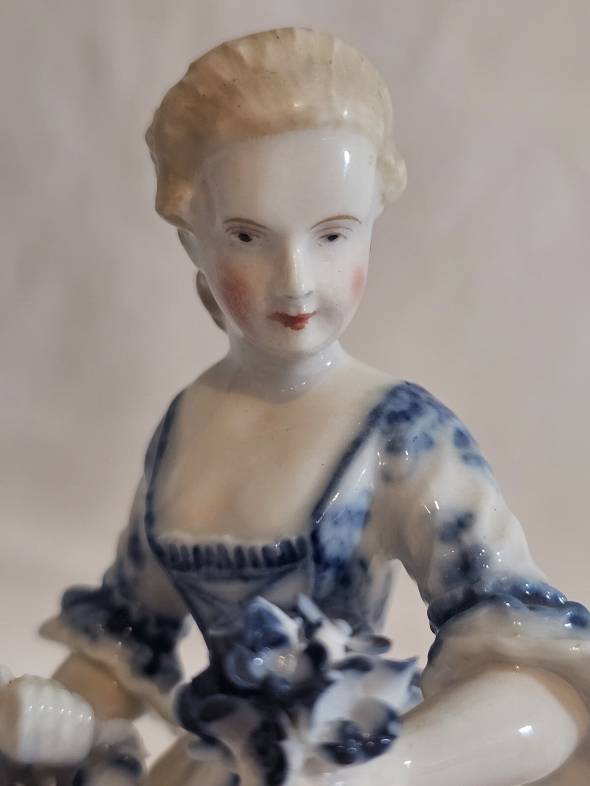 An Antique German Victorian Porcelain Figure of a Young Lady in Blue & White