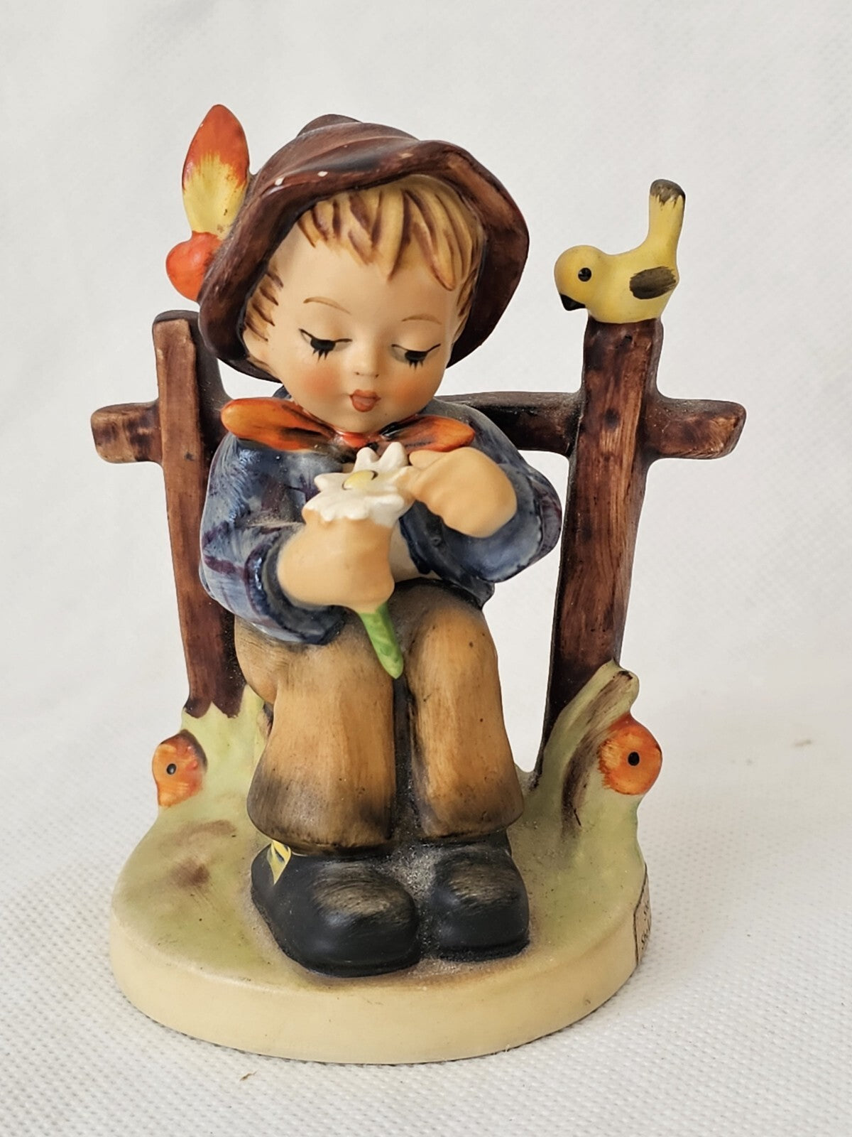 A Vintage Goebel Hummel Figurine 174, 'She Loves me, She loves Me not'