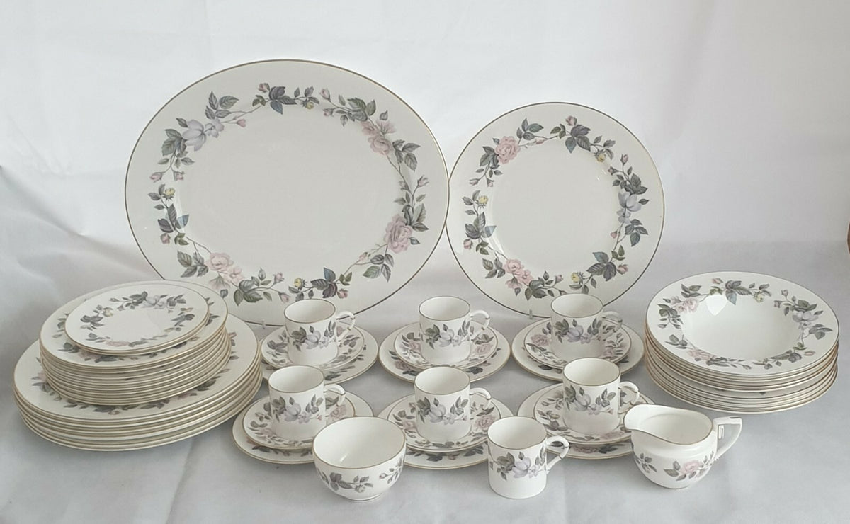 A Royal Worcester bone china June Garland pattern  dinner service