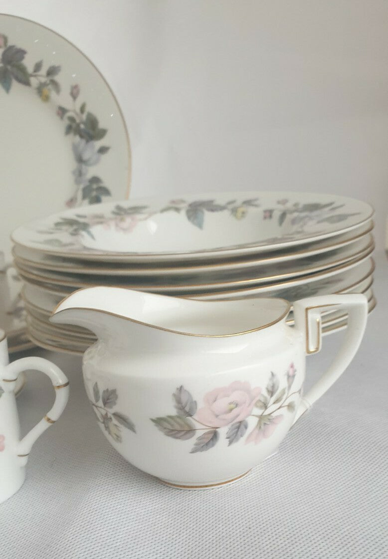 A Royal Worcester bone china June Garland pattern  dinner service
