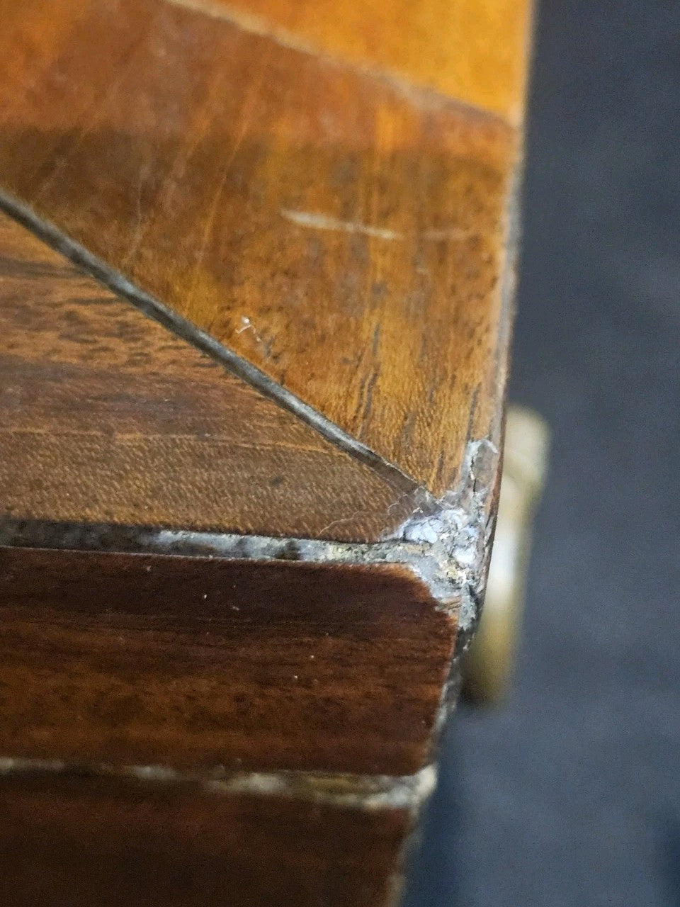 A George III Mahogany Sarcophagus Shaped Tea Chest, with Brass Twin Ring Handles