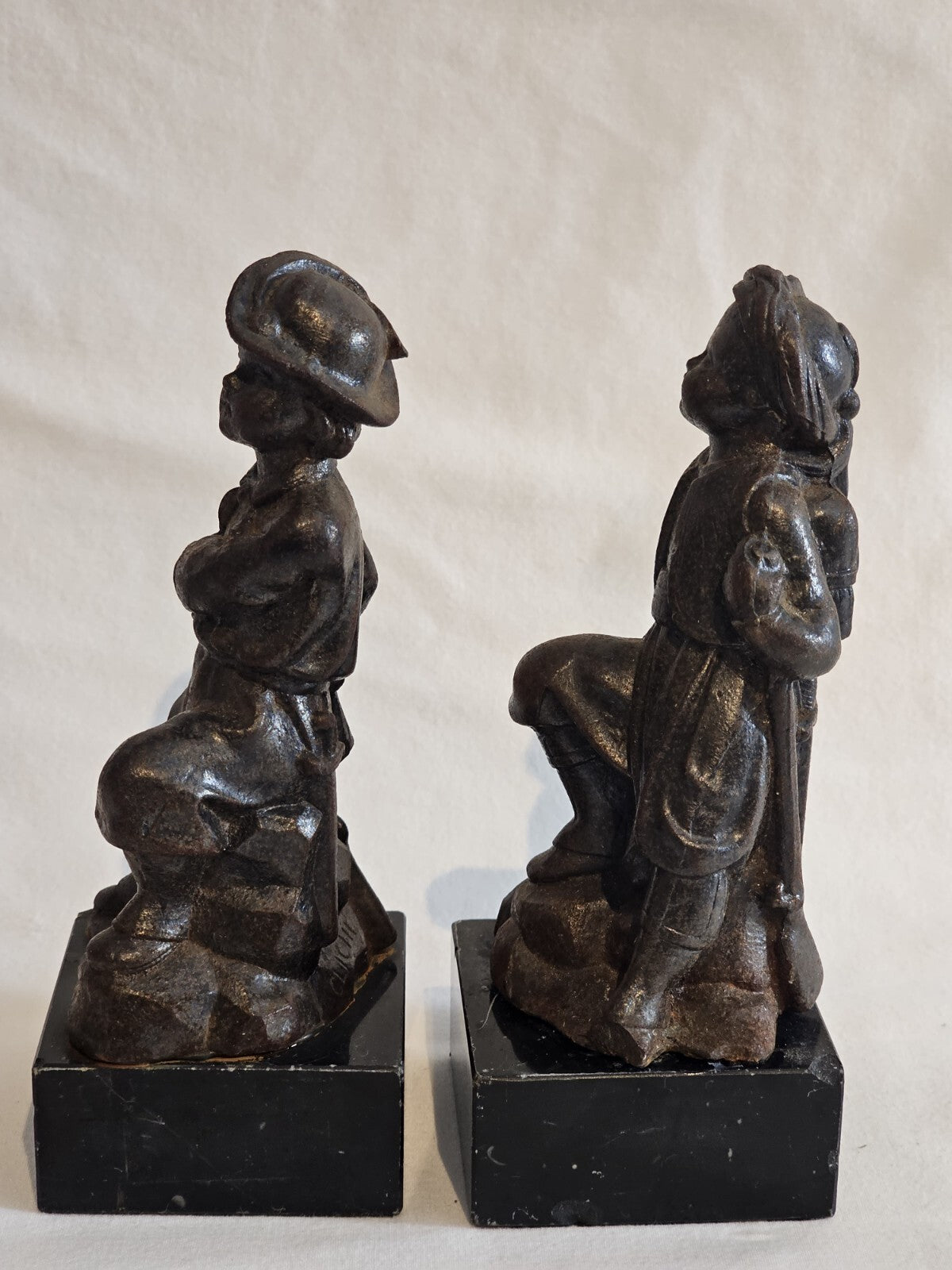 A Pair of French  Bronzed Spelter Statuettes Of Boys on a Marble Base, Signed