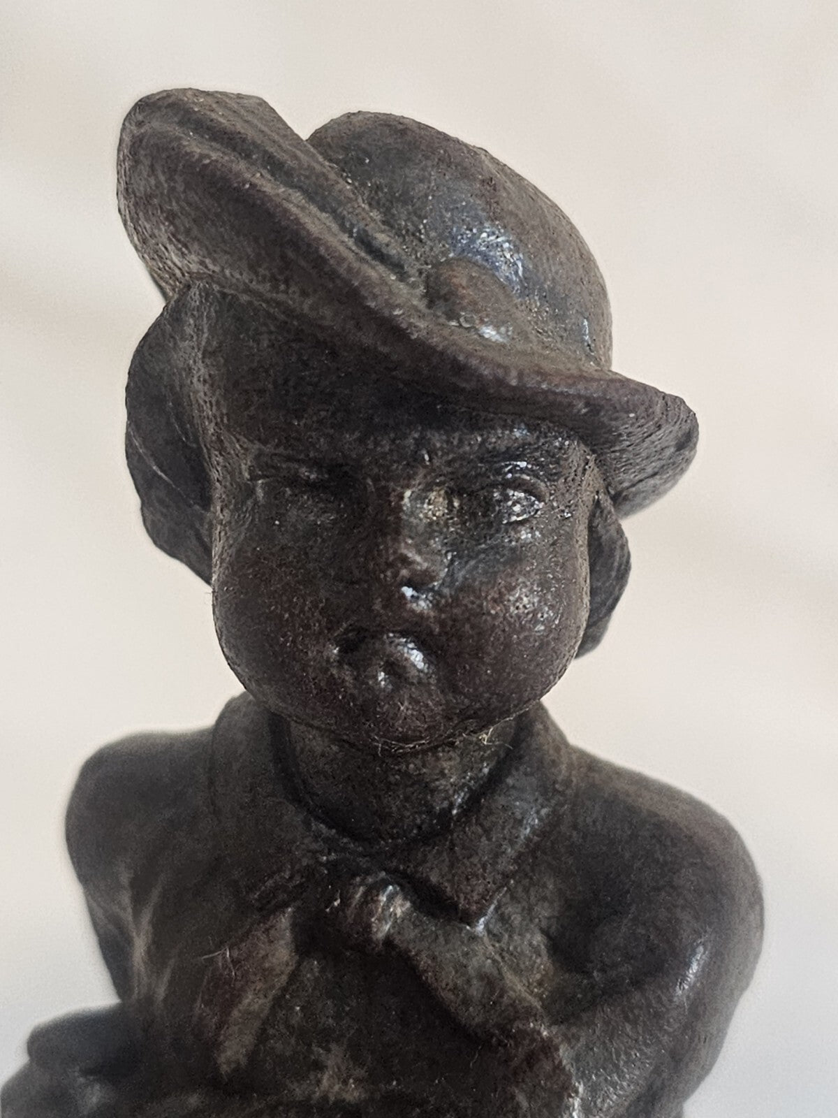 A Pair of French  Bronzed Spelter Statuettes Of Boys on a Marble Base, Signed