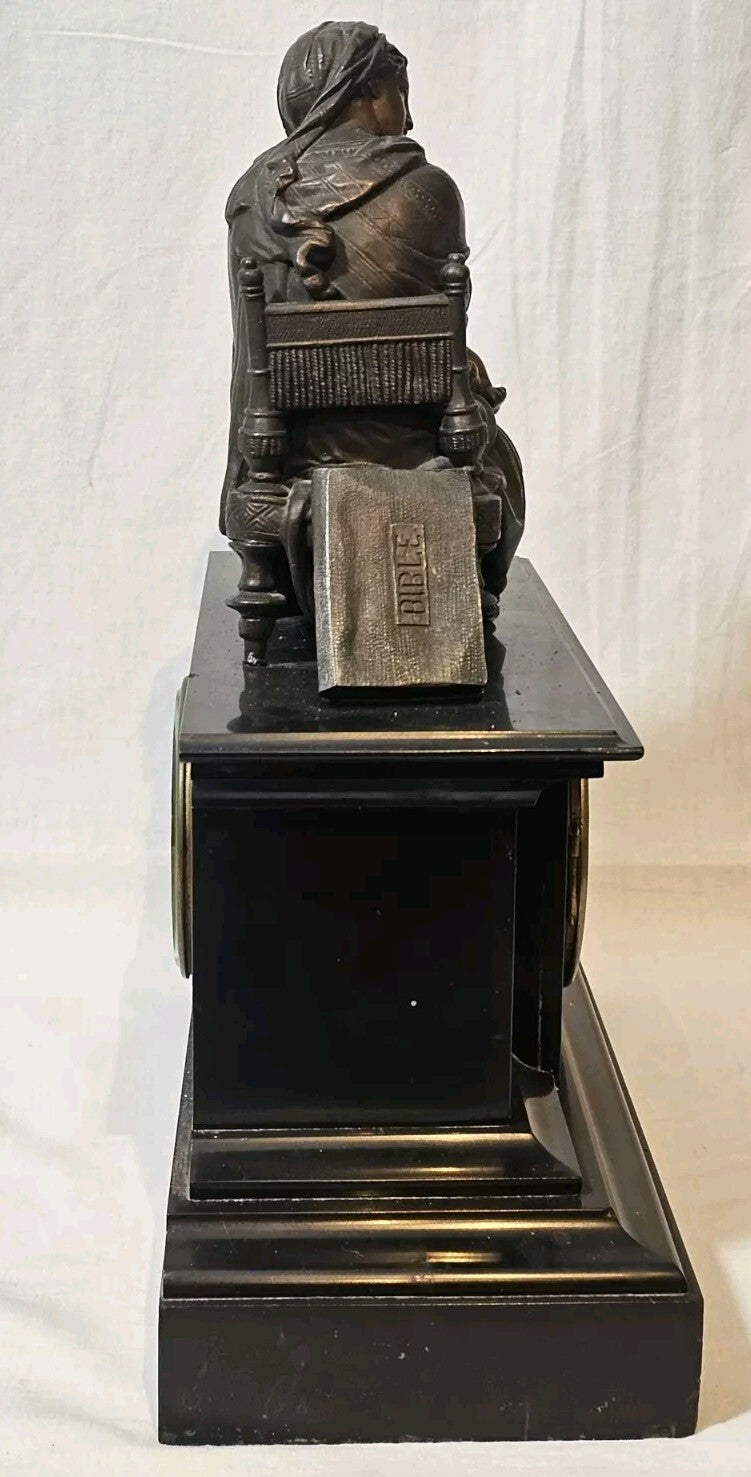 A Belgian Slate Mantle Clock, Mounted with a Spelter Figural Group