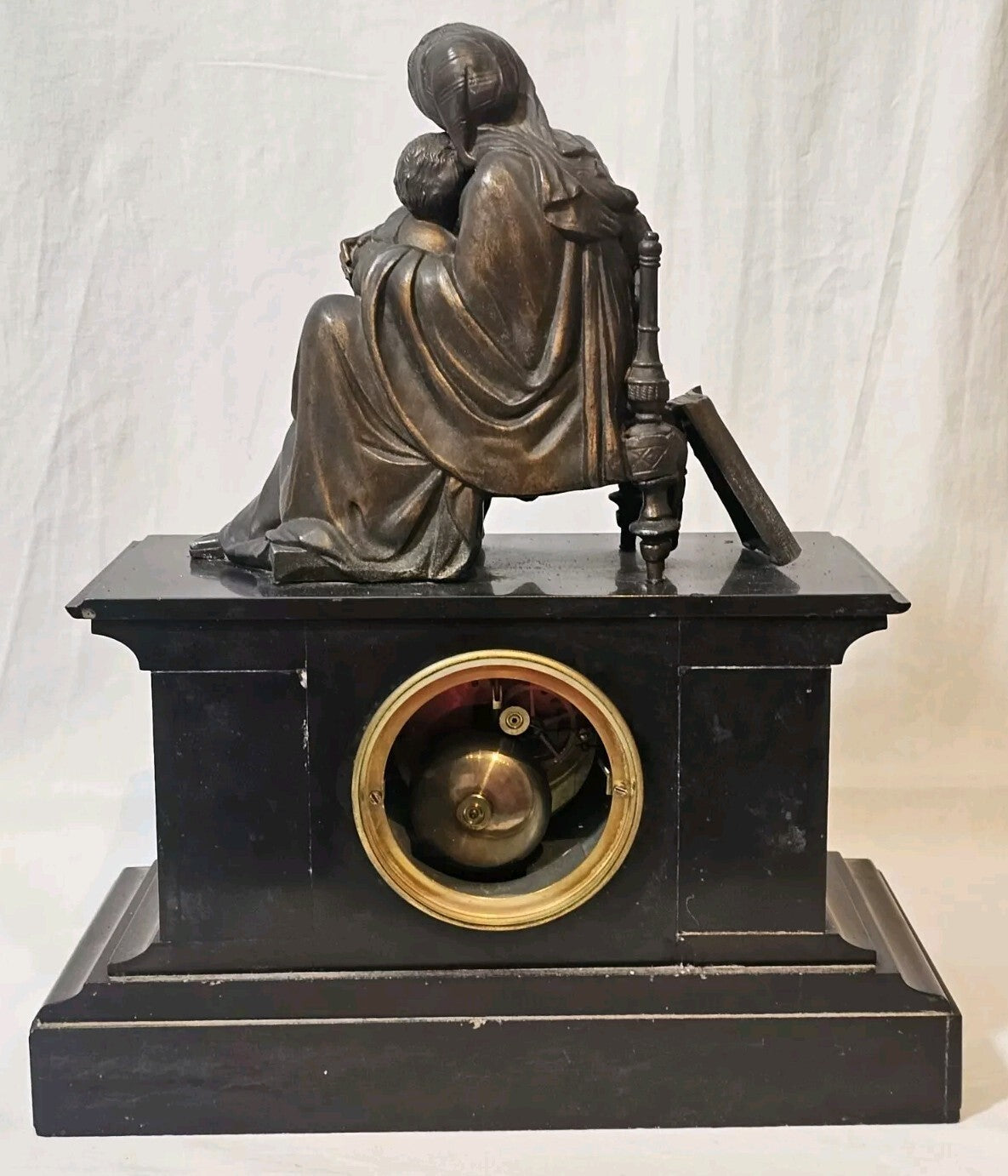 A Belgian Slate Mantle Clock, Mounted with a Spelter Figural Group