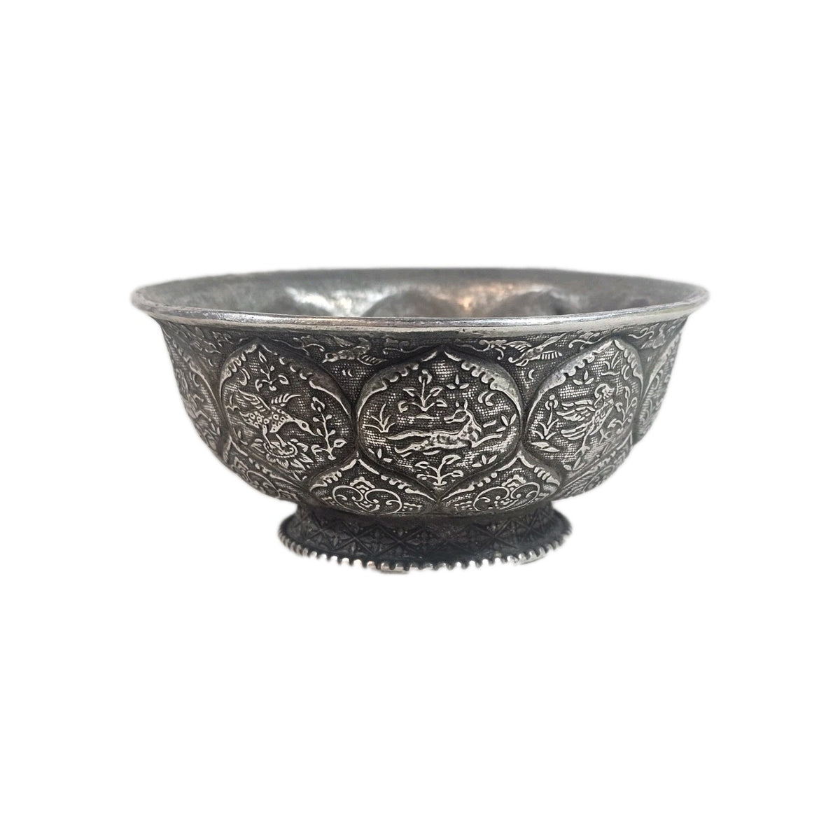 An Antique Chinese White Metal Repoussé Bowl  Decorated inside and out