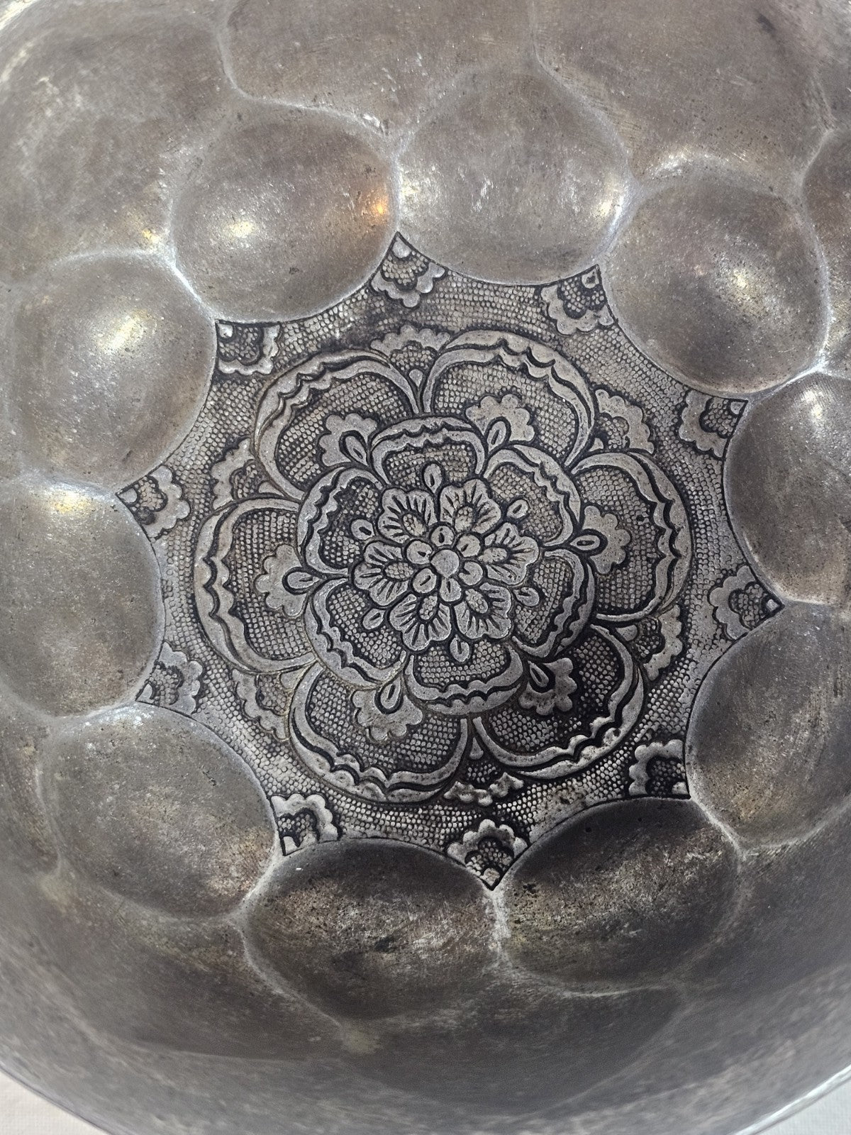 An Antique Chinese White Metal Repoussé Bowl  Decorated inside and out