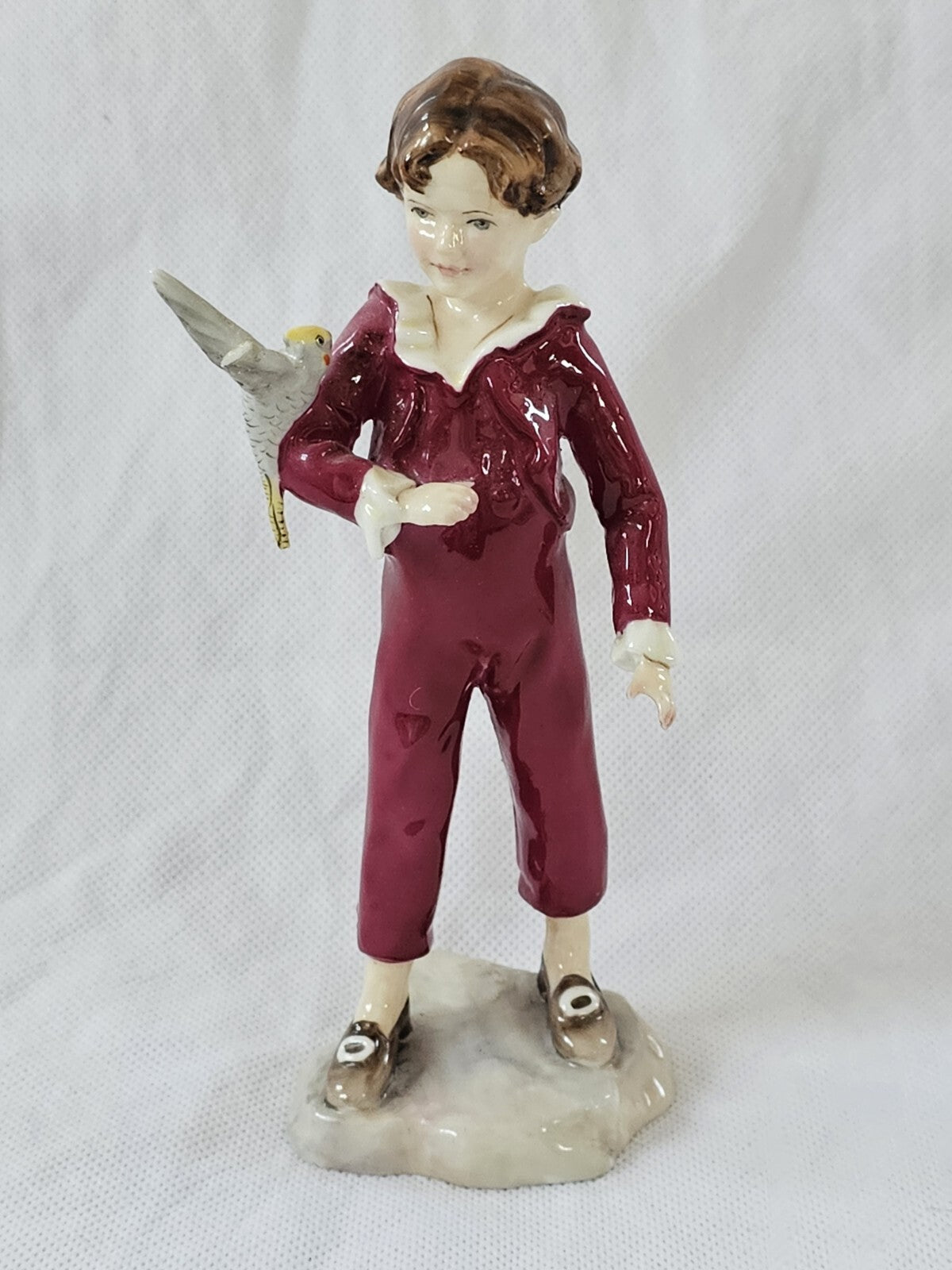 A Royal Worcester figure of the Parakeet, modelled by F G Doughty, no. 3087