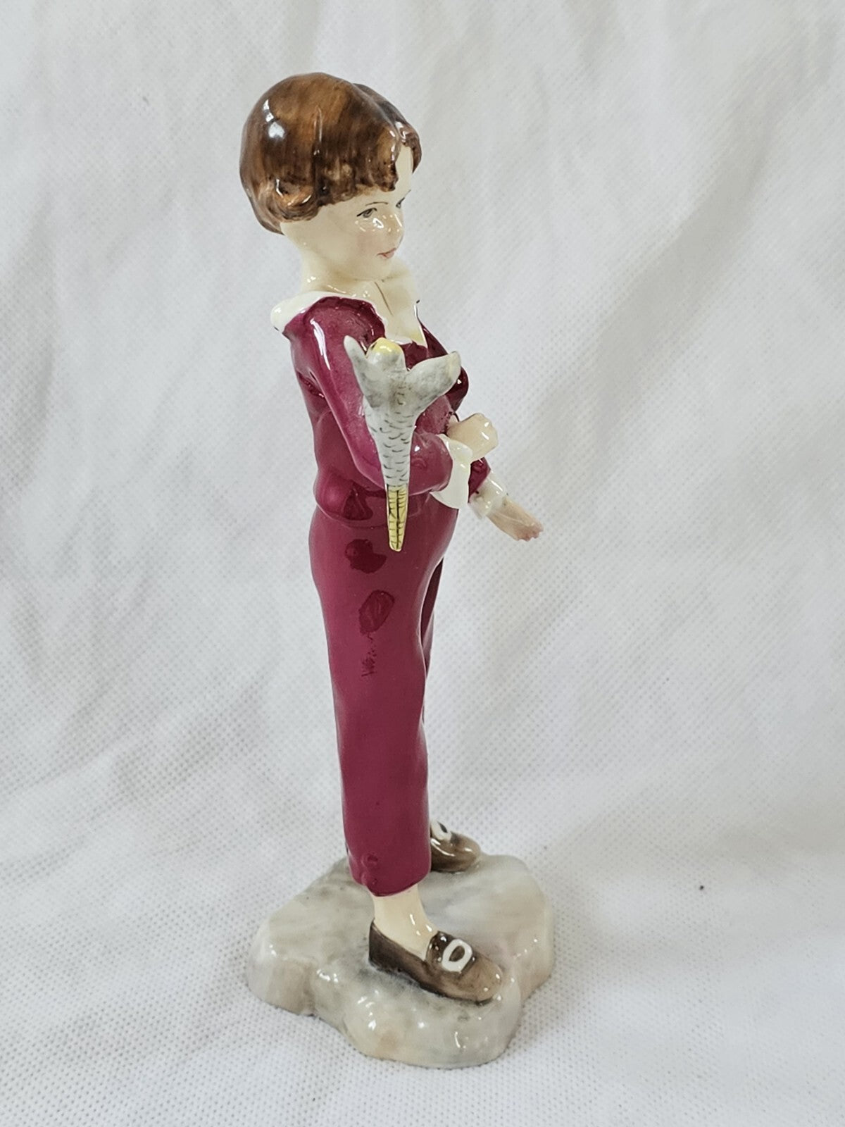 A Royal Worcester figure of the Parakeet, modelled by F G Doughty, no. 3087