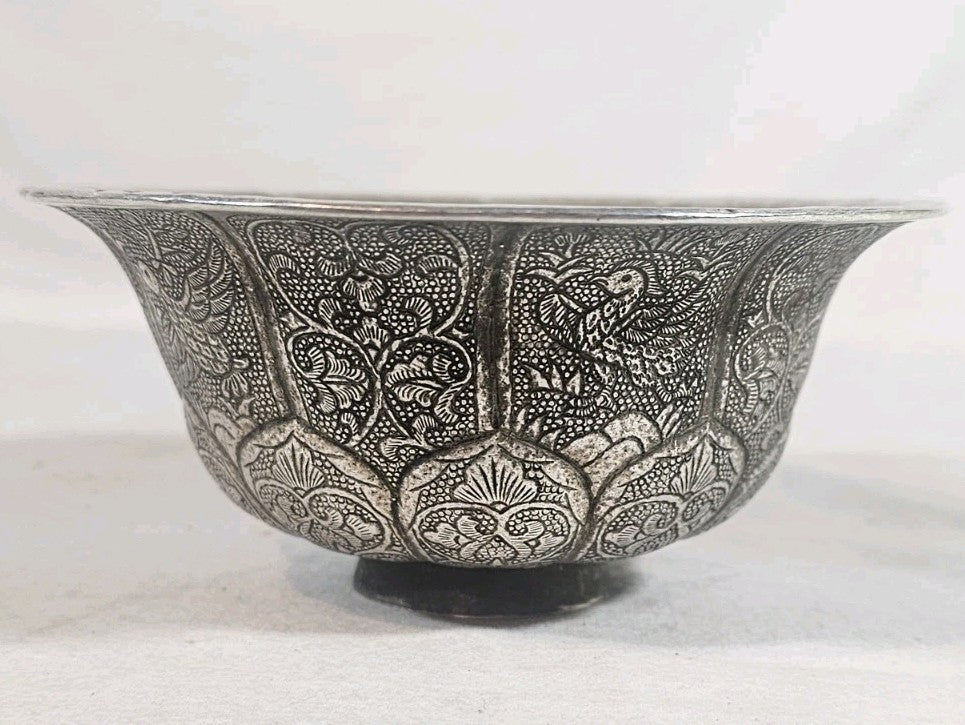 An Antique Chinese White Metal Repoussé Bowl Elaborately Decorated