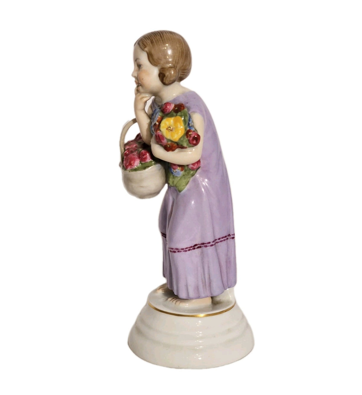 A Rosenthal Porcelain Figure of a Flower Girl by Hermann Leipold C1912