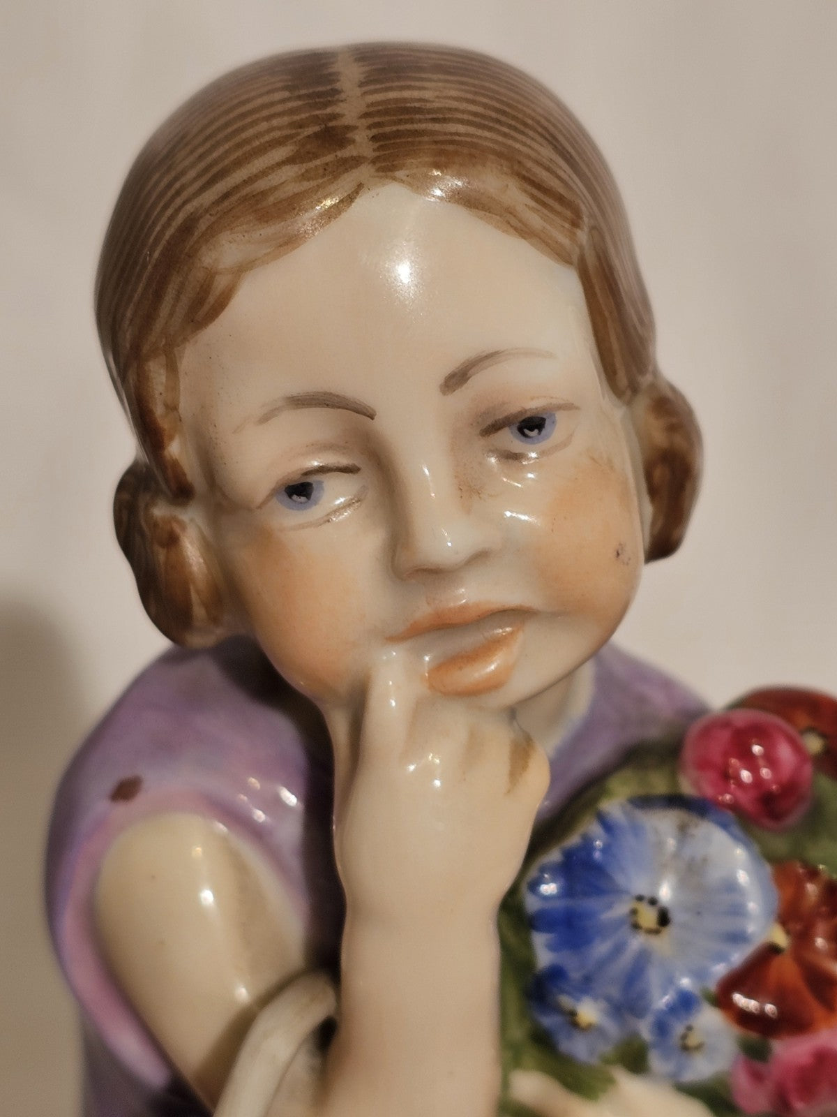 A Rosenthal Porcelain Figure of a Flower Girl by Hermann Leipold C1912