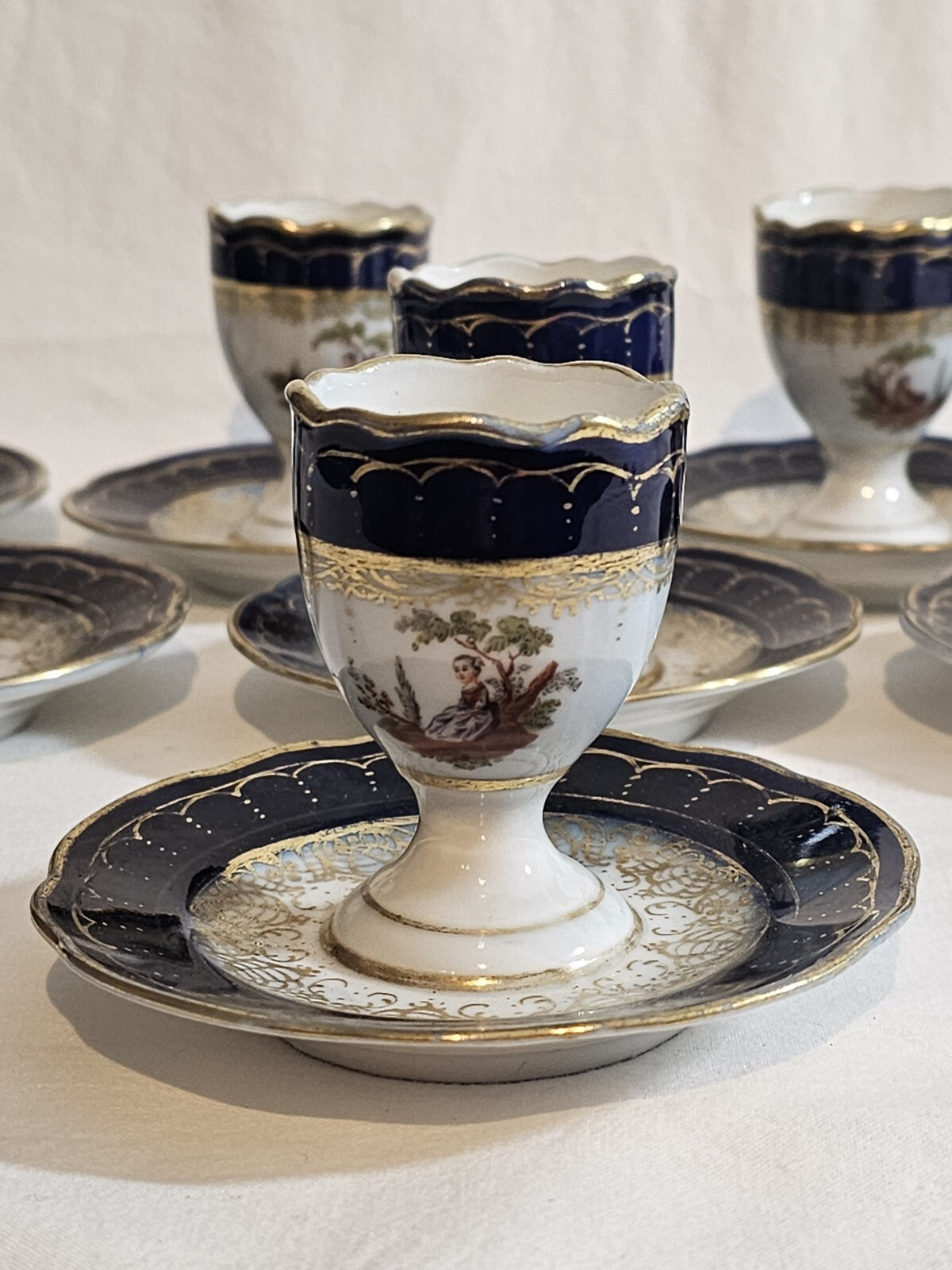 A Set of Eight 19thC German Porcelain Eggcups, Marked Meissen, Hand Painted