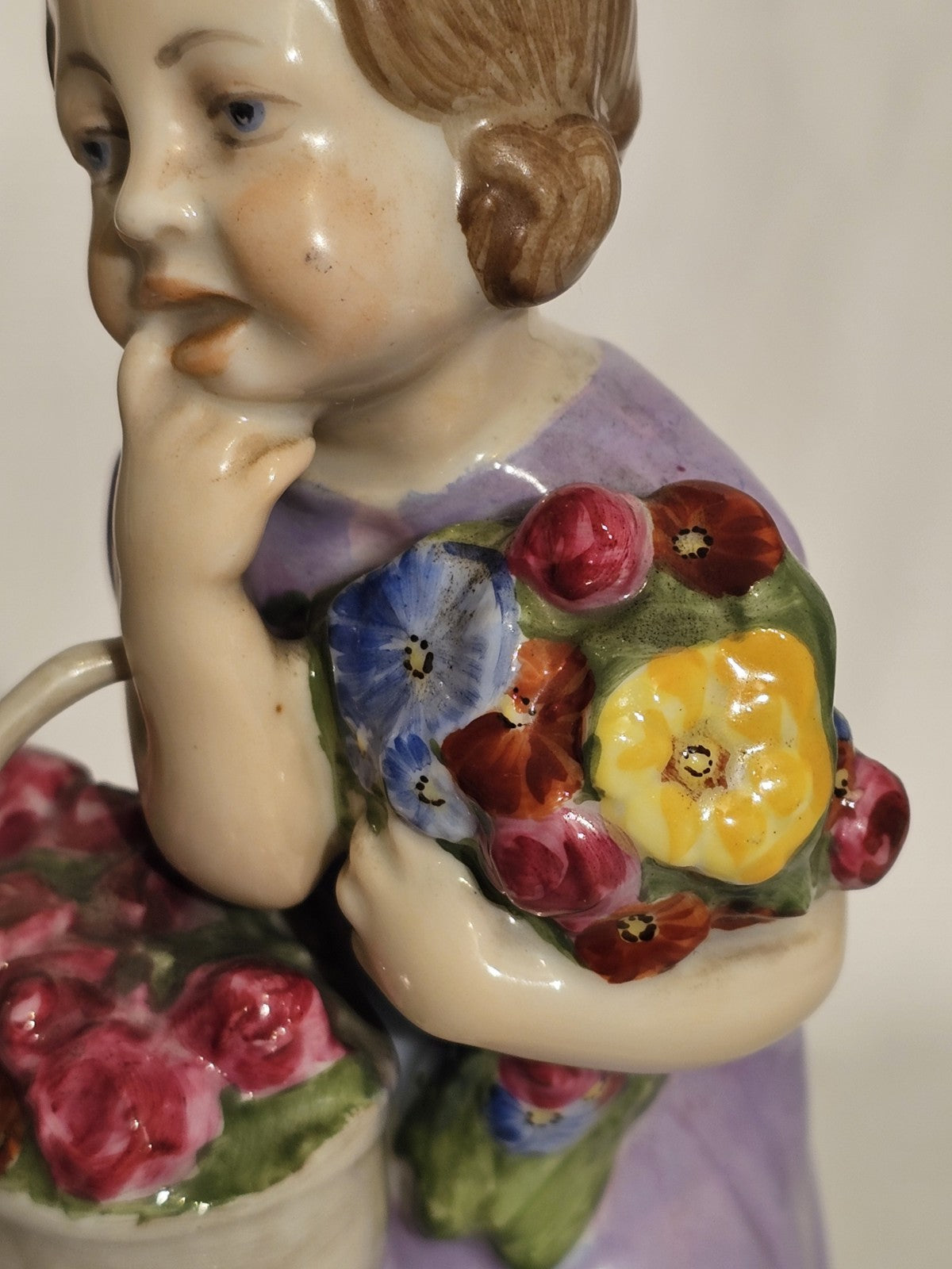 A Rosenthal Porcelain Figure of a Flower Girl by Hermann Leipold C1912