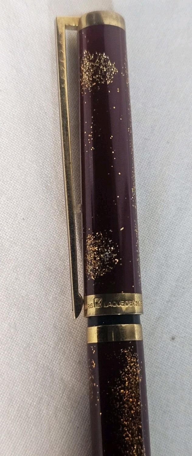 An S.T. Dupont Paris Laque de Chine Red & Gold Ballpoint Pen Gold Plated