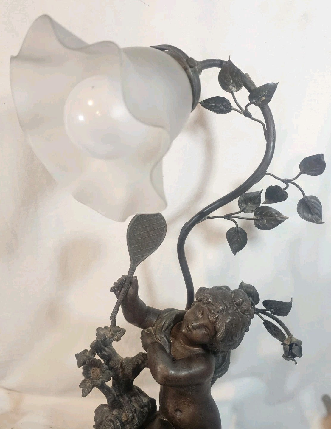 An Antique Spelter Figural Lamp of a Semi Nude Girl Playing Racket Marble Base
