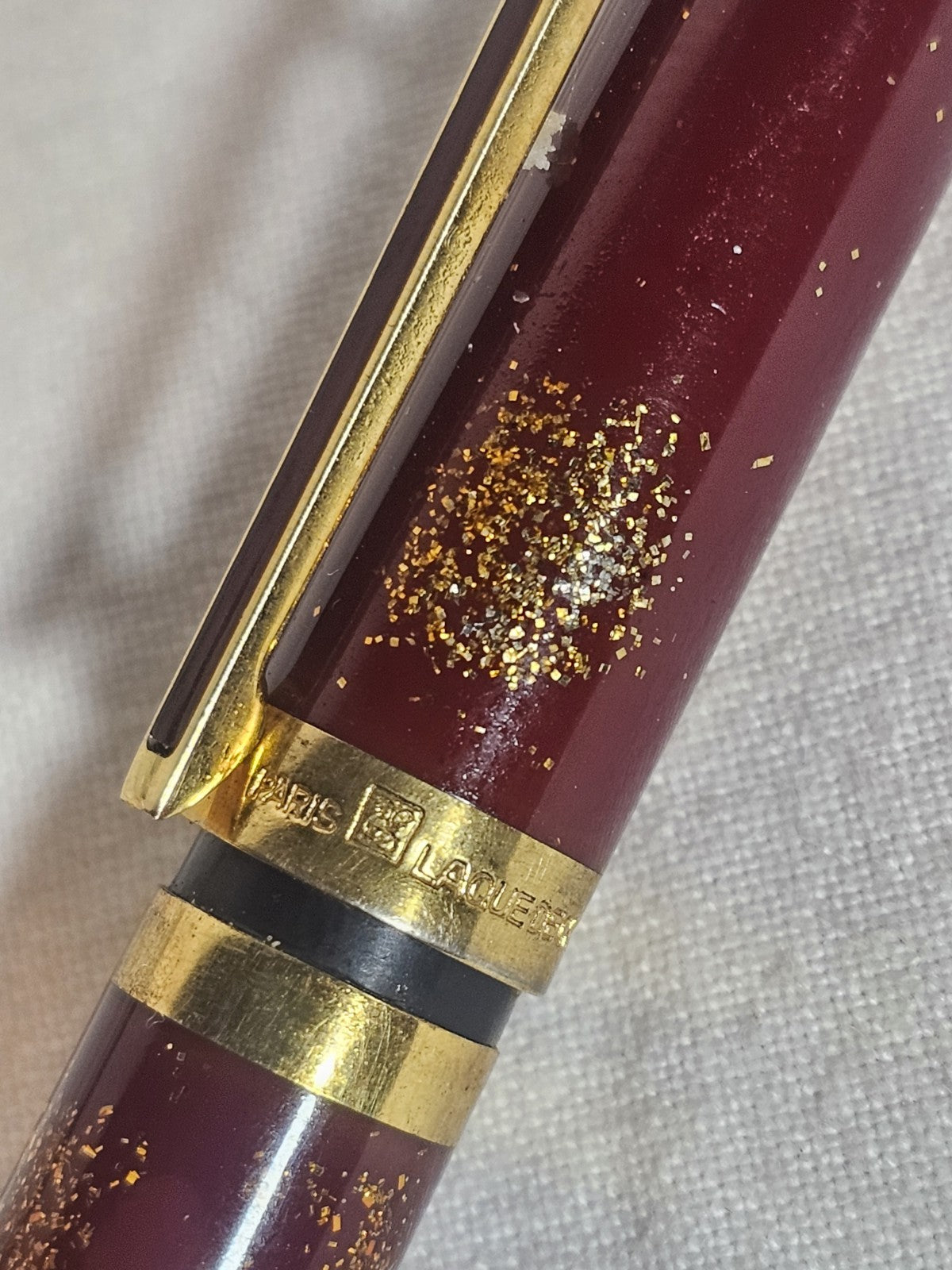 An S.T. Dupont Paris Laque de Chine Red & Gold Ballpoint Pen Gold Plated