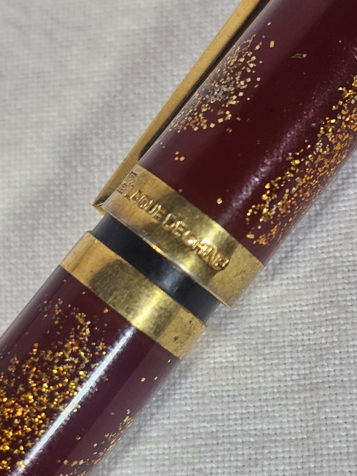 An S.T. Dupont Paris Laque de Chine Red & Gold Ballpoint Pen Gold Plated