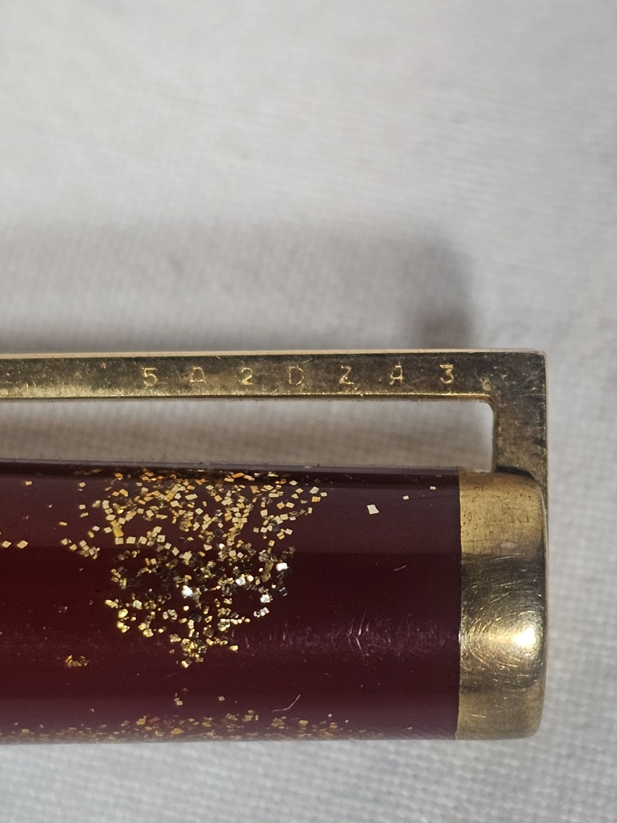 An S.T. Dupont Paris Laque de Chine Red & Gold Ballpoint Pen Gold Plated