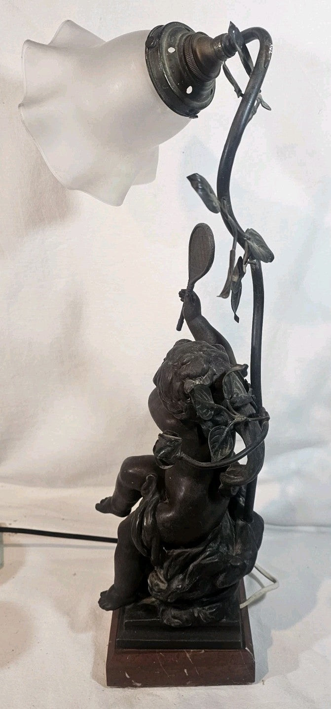 An Antique Spelter Figural Lamp of a Semi Nude Girl Playing Racket Marble Base
